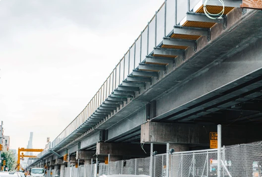 Raised highway with a transparent noise barrier